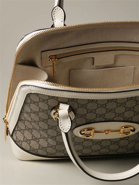 borsa gucci di tela con cercchi d'oro|Borse a mano GUCCI da Donna .